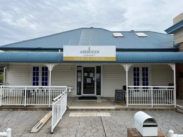 The front of Aberdeen Surgery Medical Centre with its sign above the verandah